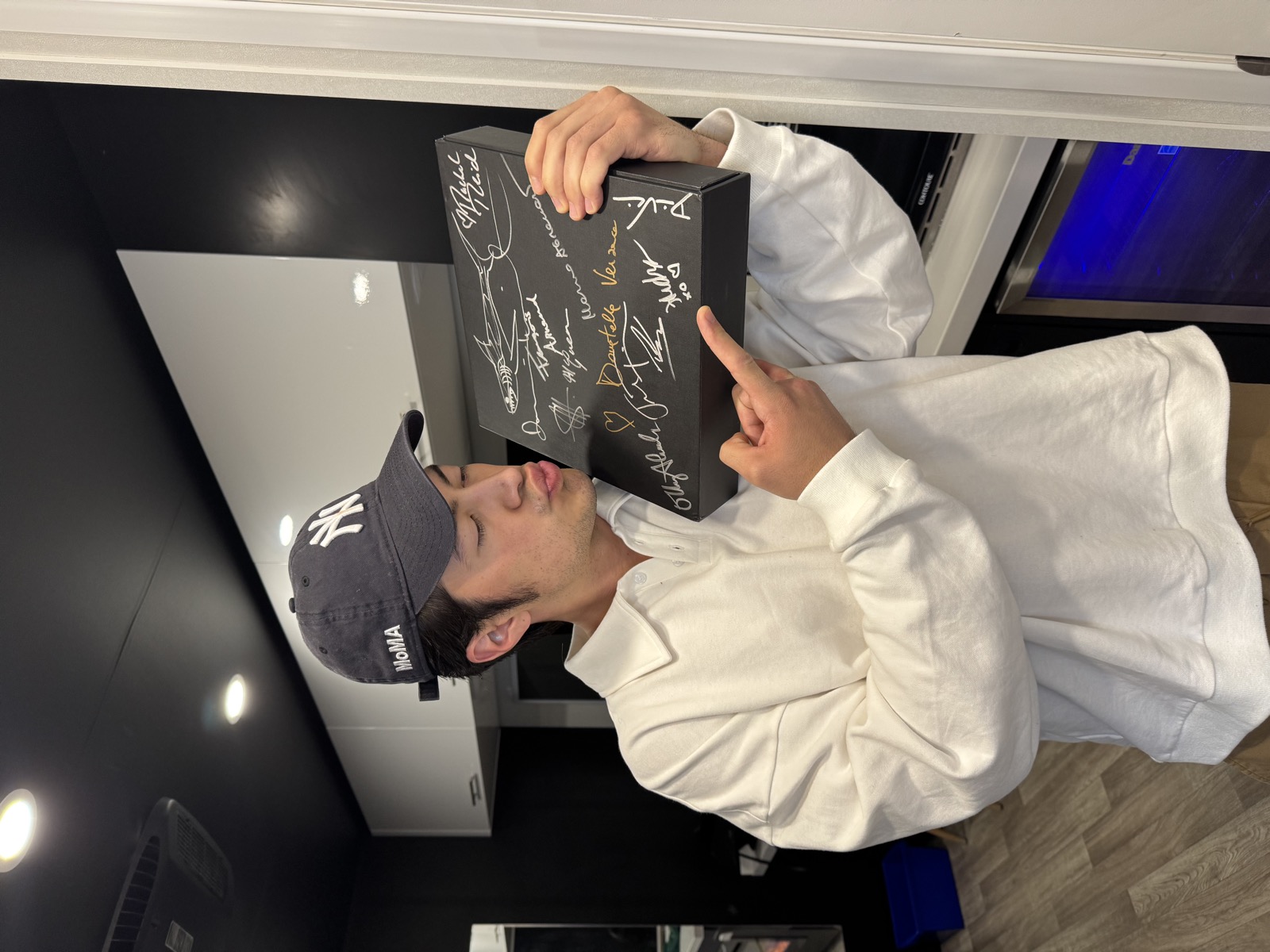 Hudson Williams signing the Misfits Pride Edition